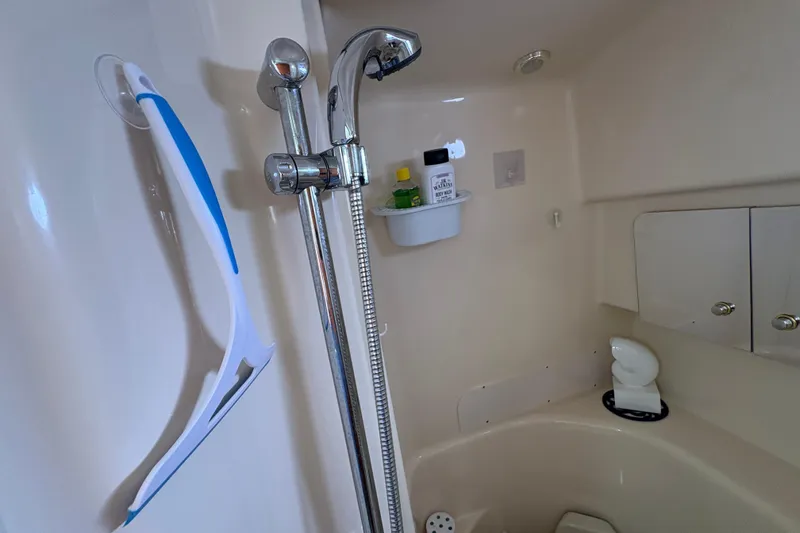 Slide: The Image of Bathroom interior of 2003 Sea Ray 360 Sundancer yacht with shower and storage. - 40
