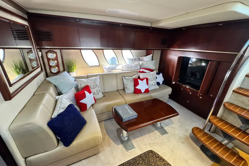 Slide: The Image of Luxurious interior of 2006 Sea Ray 48 Sundancer yacht with plush seating and elegant decor. - 10