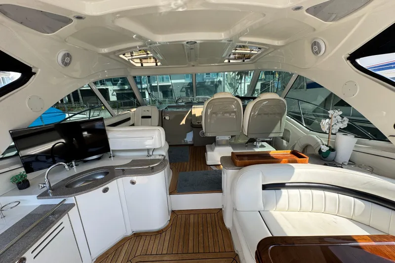 Slide: The Image of Luxurious interior of a 2006 Sea Ray 48 Sundancer yacht with modern amenities. - 24