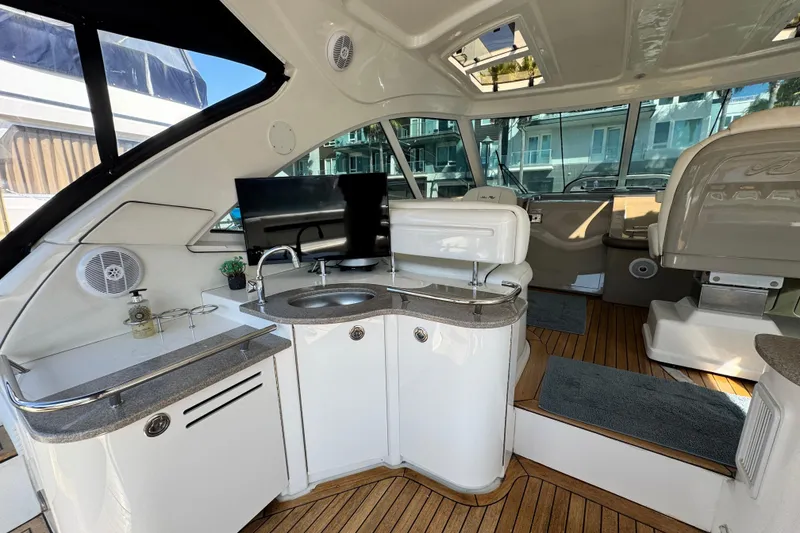 Slide: The Image of Luxurious interior of 2006 Sea Ray 48 Sundancer yacht with modern amenities and sleek design. - 28