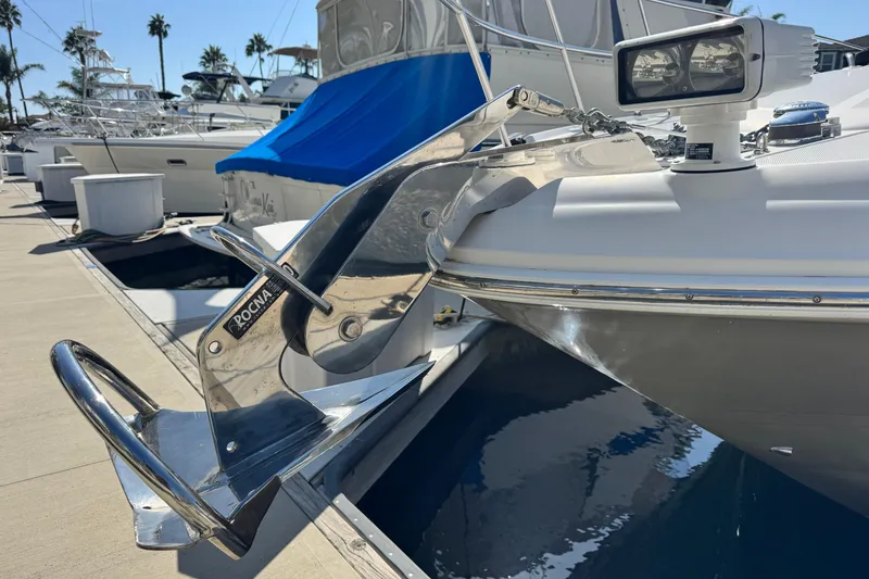 Slide: The Image of 2006 Sea Ray 48 Sundancer with Rocna anchor at marina, sunny day. - 41