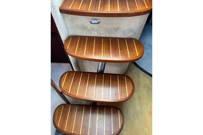 Slide: The Image of Wooden steps on a 2006 Sea Ray 48 Sundancer yacht interior. - 8