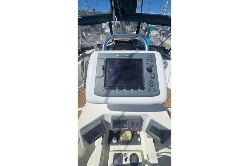 Slide: The Image of Cockpit of 1996 Beneteau Oceanis 440 sailboat with navigation equipment. - 10