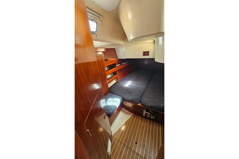Slide: The Image of Cozy cabin interior of 1996 Beneteau Oceanis 440 sailboat with wooden finishes. - 43