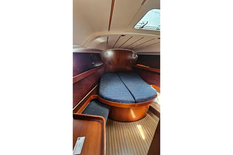 Slide: The Image of Cozy cabin interior of 1996 Beneteau Oceanis 440 sailboat with wooden finish and skylight. - 47