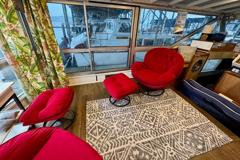 Slide: The Image of Cozy interior of 1970 Chris-Craft Commander 42 with red chairs and patterned rug. - 16