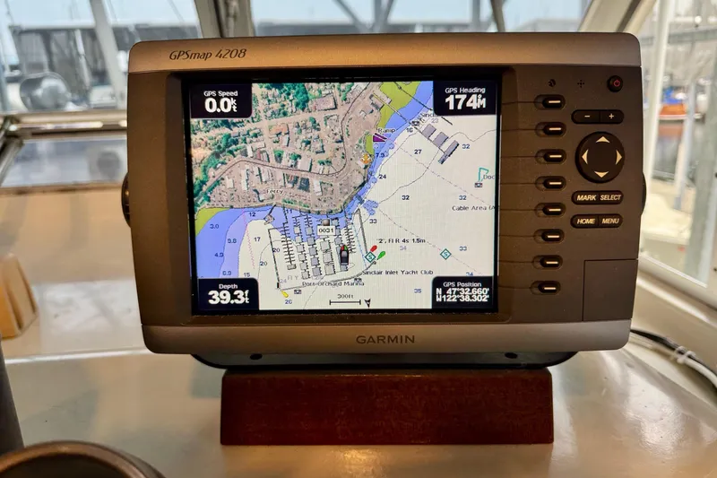 Slide: The Image of Garmin GPSmap 4208 on 1970 Chris-Craft Commander 42, displaying nautical chart and navigation data. - 22