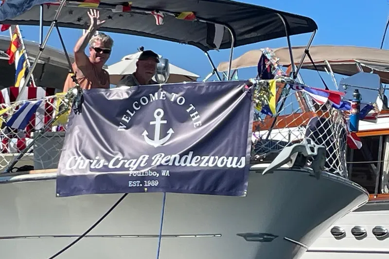 Slide: The Image of 1970 Chris-Craft Commander 42 at Chris-Craft Rendezvous, Poulsbo, WA, with festive decorations. - 77