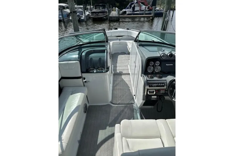Slide: The Image of 2015 Formula 310 Bowrider interior with sleek dashboard and comfortable seating. - 10