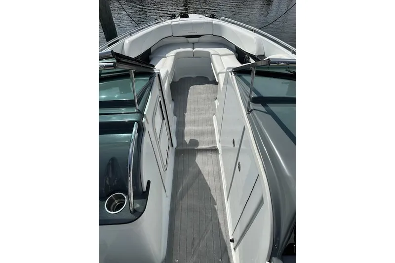 Slide: The Image of 2015 Formula 310 Bowrider boat interior with spacious seating and sleek design. - 9