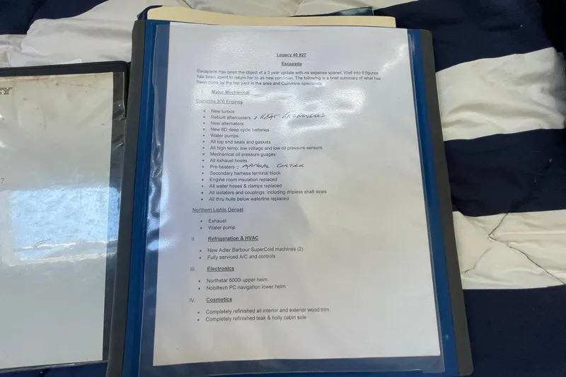 Slide: The Image of Document detailing maintenance and upgrades for 1999 Legacy Yachts 40 Sedan, including mechanical and cosmetic work. - 77