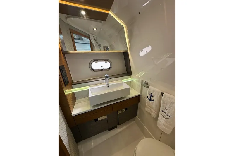 Slide: The Image of Luxurious bathroom in 2021 Tiara Sport 43 LS yacht with modern sink and elegant design. - 36