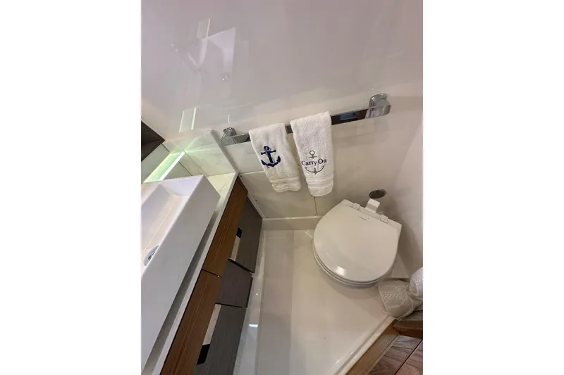 Slide: The Image of Bathroom interior of 2021 Tiara Sport 43 LS yacht with modern fixtures. - 37