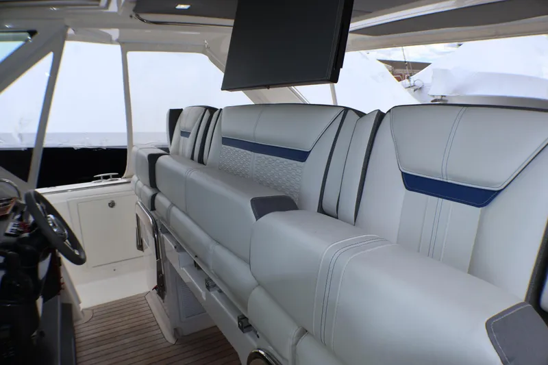 Slide: The Image of Interior of 2021 Tiara Sport 43 LS boat with luxurious seating and modern design. - 78