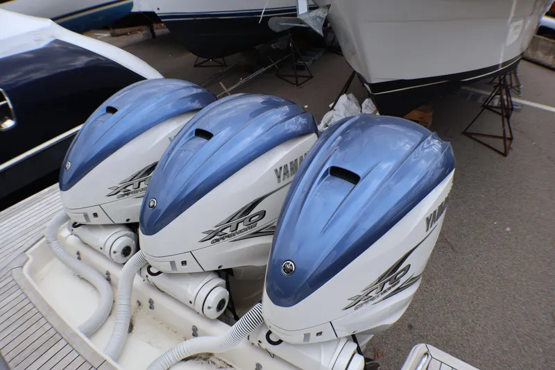 Slide: The Image of Triple Yamaha XTO Offshore engines on a 2021 Tiara Sport 43 LS boat. - 86