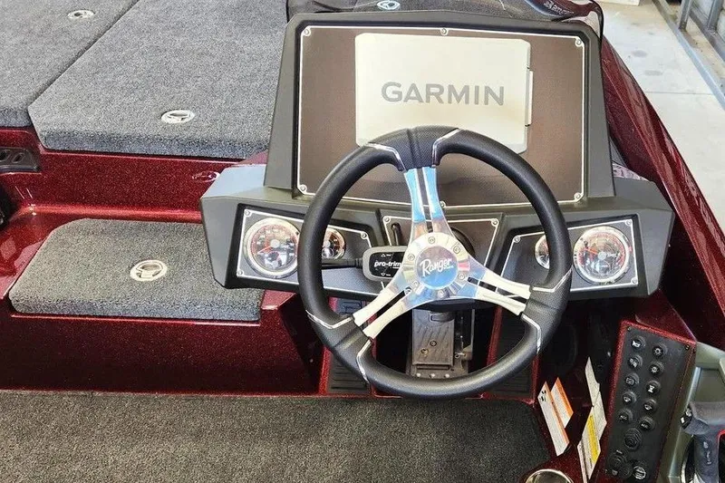 Slide: The Image of 2026 Ranger Z518 Cup-Equipped boat with Mercury Pro XS 200 engine in showroom. - 3