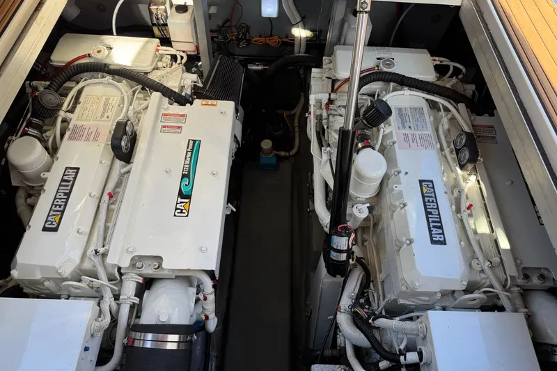 Slide: The Image of Engine room of a 2000 Sea Ray 380 Sundancer with twin Caterpillar engines. - 16