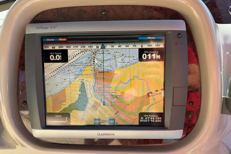 Slide: The Image of Garmin GPS display on 2000 Sea Ray 380 Sundancer, showing nautical chart and navigation details. - 9