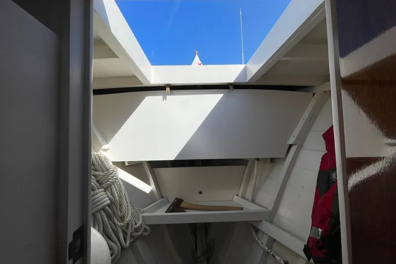 Slide: The Image of Interior of 1939 Richardson 26 Little Giant boat with ropes and equipment. - 14