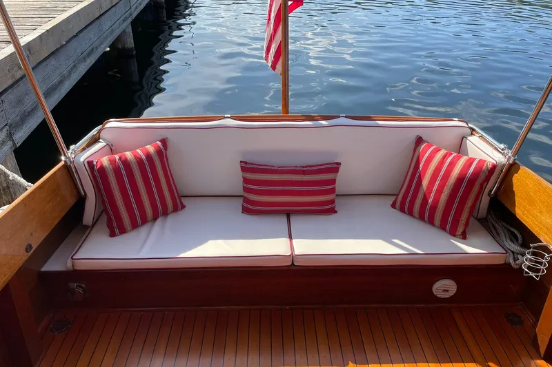 Slide: The Image of Elegant 1939 Richardson 26 Little Giant boat with striped cushions and wooden deck. - 25