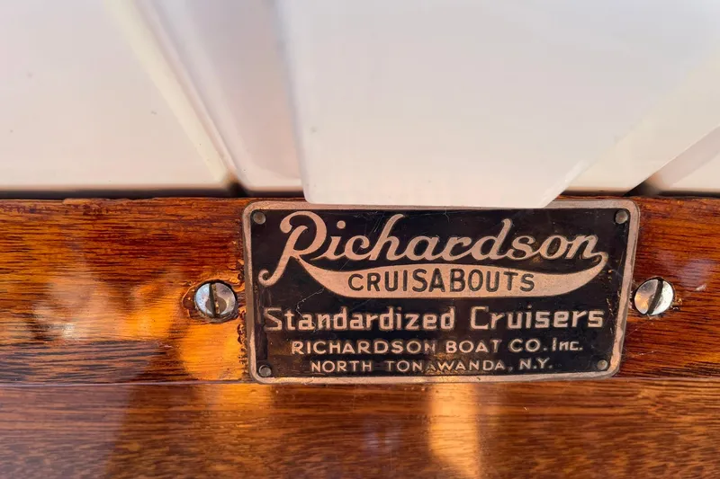 Slide: The Image of Plaque on 1939 Richardson 26 Little Giant boat, featuring "Cruisabouts" branding. - 31