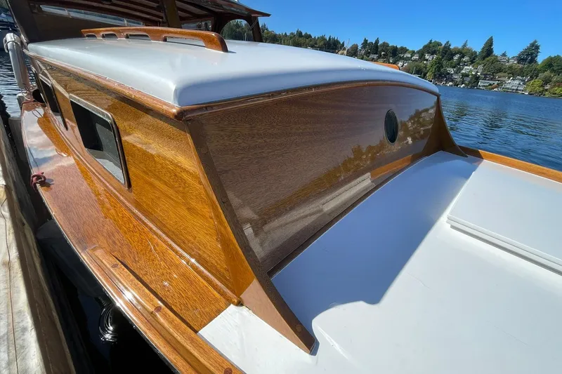 Slide: The Image of 1939 Richardson 26 Little Giant boat with polished wood finish on a sunny day. - 36