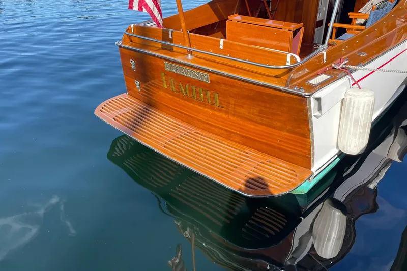 Slide: The Image of Vintage 1939 Richardson 26 Little Giant boat with wooden deck and American flag. - 39