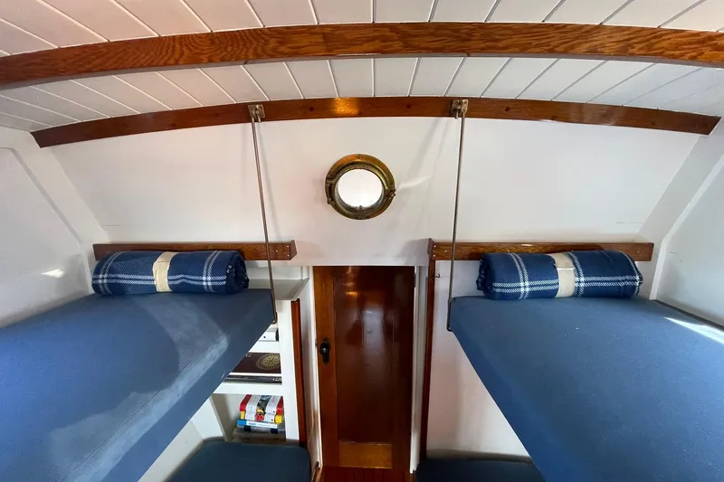 Slide: The Image of Interior of 1939 Richardson 26 Little Giant boat with cozy bunks and porthole. - 7