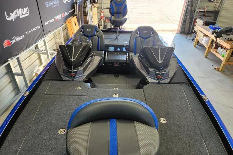 Slide: The Image of 2024 Ranger Z520R Ranger Cup Equipped boat interior with dual consoles and seating. - 4