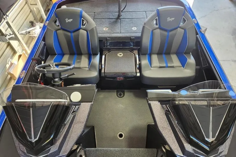 Slide: The Image of 2024 Ranger Z520R Ranger Cup boat interior with dual seats and steering wheel. - 6
