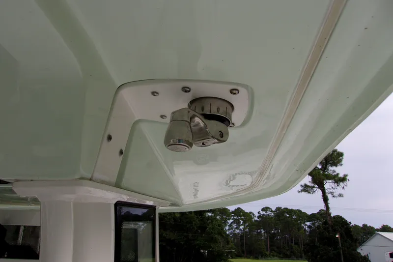 Slide: The Image of Close-up of 2025 Tidewater 320 CC Adventure boat's underside detail. - 13
