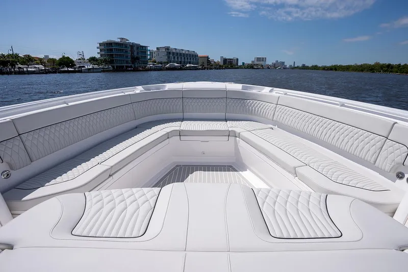 Slide: The Image of Manufacturer Provided Image: Luxurious seating area on the 2025 Intrepid 51 Panacea yacht. - 18