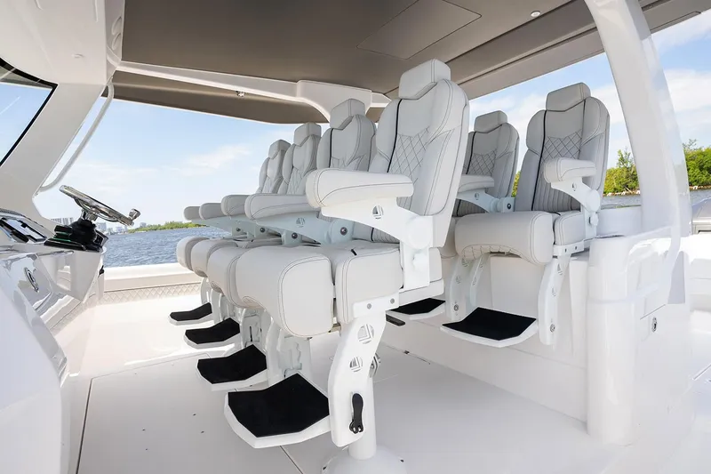 Slide: The Image of Manufacturer Provided Image: Luxurious seating on the 2025 Intrepid 51 Panacea yacht, featuring ergonomic design and premium materials. - 21