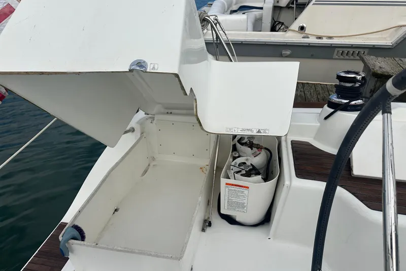 Slide: The Image of Open storage compartment on 2011 Beneteau Oceanis 37 sailboat deck. - 17