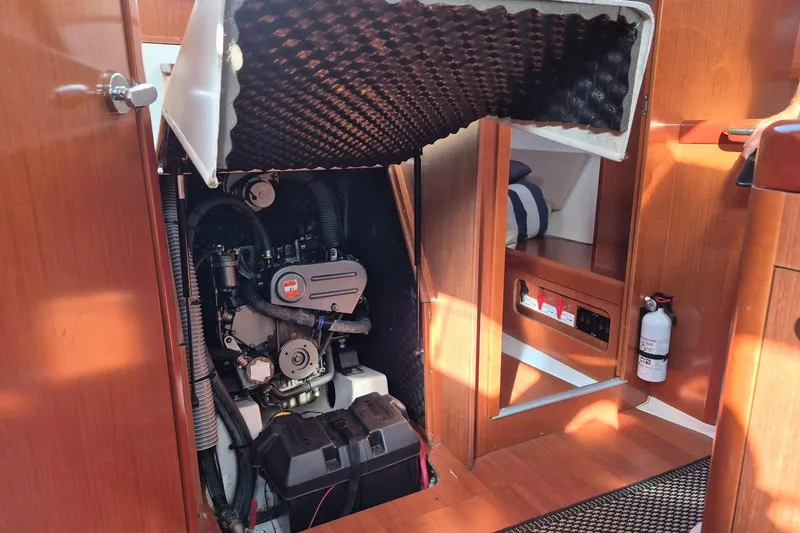 Slide: The Image of Engine compartment of a 2011 Beneteau Oceanis 37 sailboat, showcasing interior details. - 35