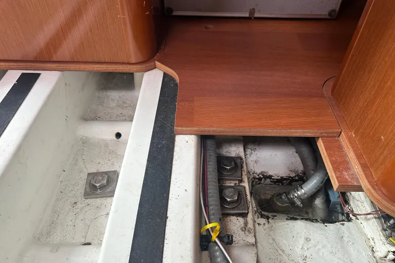Slide: The Image of Interior view of 2011 Beneteau Oceanis 37 sailboat showing floorboards and wiring. - 38