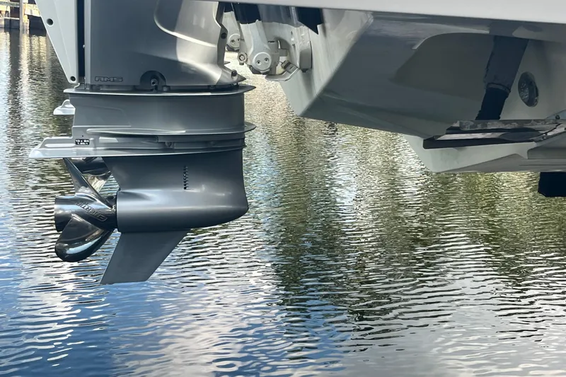 Slide: The Image of Outboard motor of 2021 Axopar 37 Cross Cabin on water. - 11