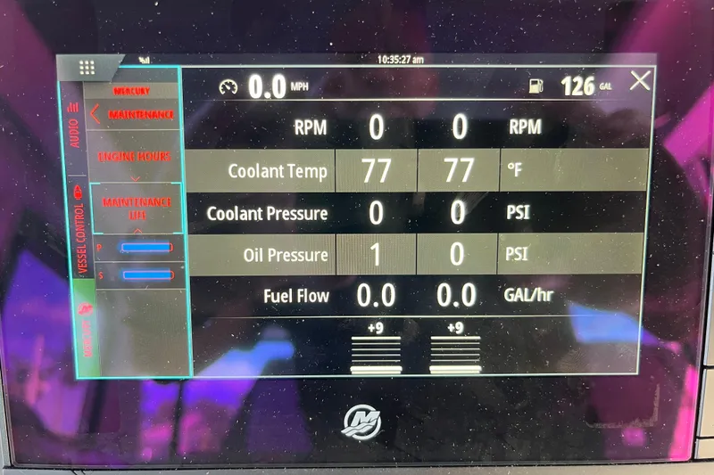 Slide: The Image of Dashboard display of a 2021 Axopar 37 Cross Cabin showing engine metrics and fuel level. - 32
