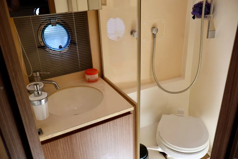Slide: The Image of Bathroom interior of 2014 Azimut 38 yacht with sink, shower, and toilet. - 19