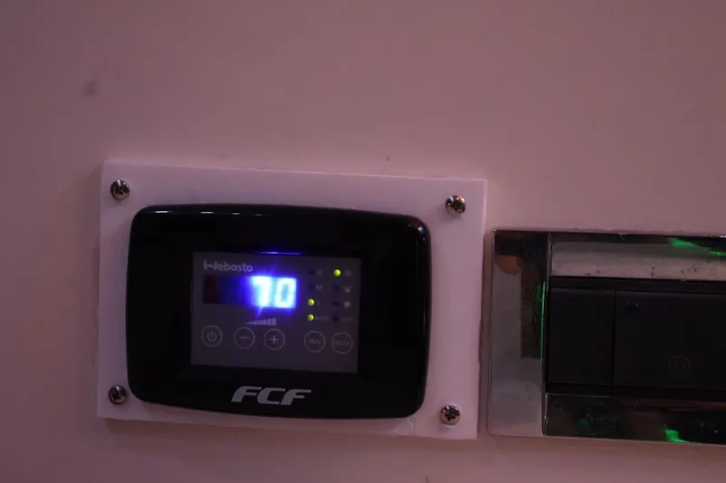 Slide: The Image of Digital thermostat display on 2014 Azimut 38 yacht interior. - 26