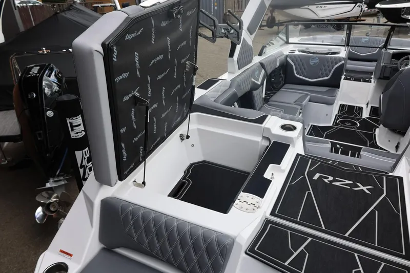 Slide: The Image of 2026 Tigé 22RZX boat interior with sleek seating and modern design features. - 19