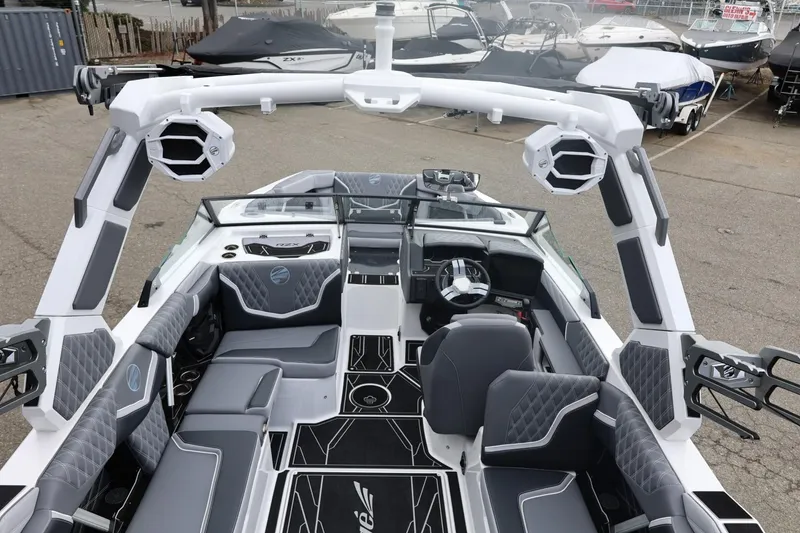 Slide: The Image of 2026 Tigé 22RZX boat interior with modern seating and advanced audio system. - 20
