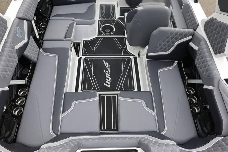 Slide: The Image of Luxurious interior of 2026 Tigé 22RZX boat with stylish gray seating and modern design. - 23