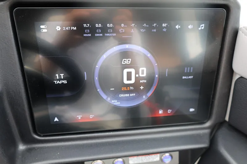 Slide: The Image of Touchscreen display of 2026 Tigé 22RZX boat showing speed and control settings. - 35