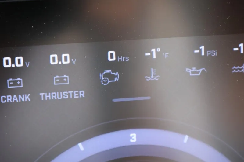 Slide: The Image of Dashboard display of 2026 Tigé 22RZX boat showing voltage, temperature, and pressure readings. - 36