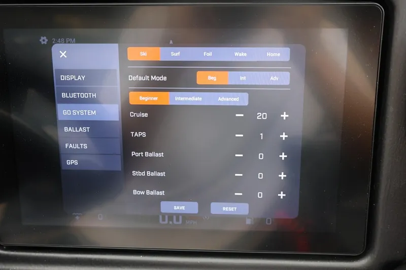 Slide: The Image of Touchscreen display of 2026 Tigé 22RZX boat showing control settings for cruise and ballast. - 39