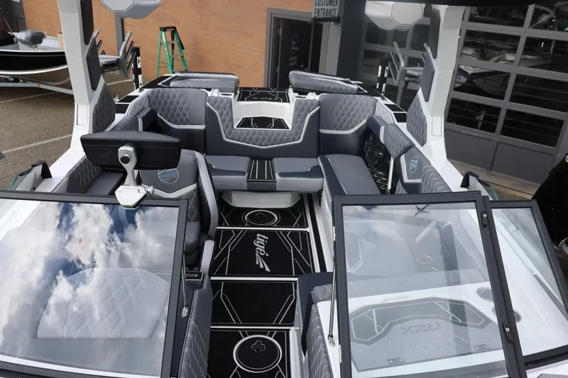 Slide: The Image of 2026 Tigé 22RZX boat interior with modern seating and sleek design. - 53