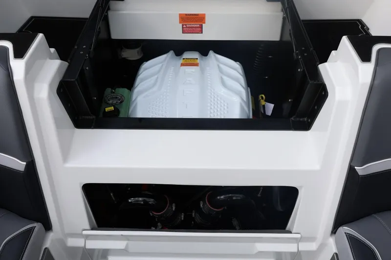 Slide: The Image of Engine compartment of 2026 Tigé 22RZX boat, showcasing modern design and components. - 56