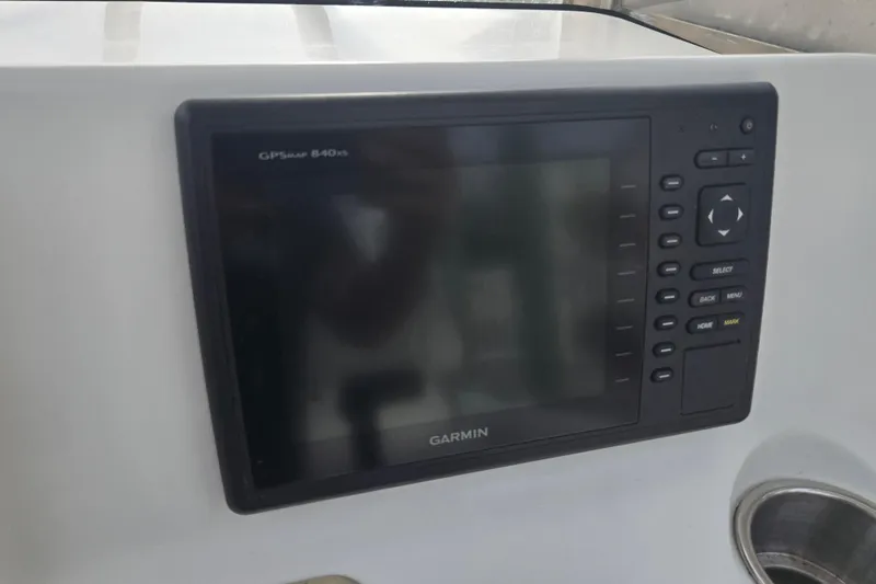 Slide: The Image of Hour meter reading 1236.7 on 2008 Sea Hunt Ultra 232 dashboard. - 15