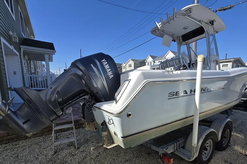 Slide: The Image of 2008 Sea Hunt Ultra 232 boat with Yamaha outboard motor on trailer. - 20